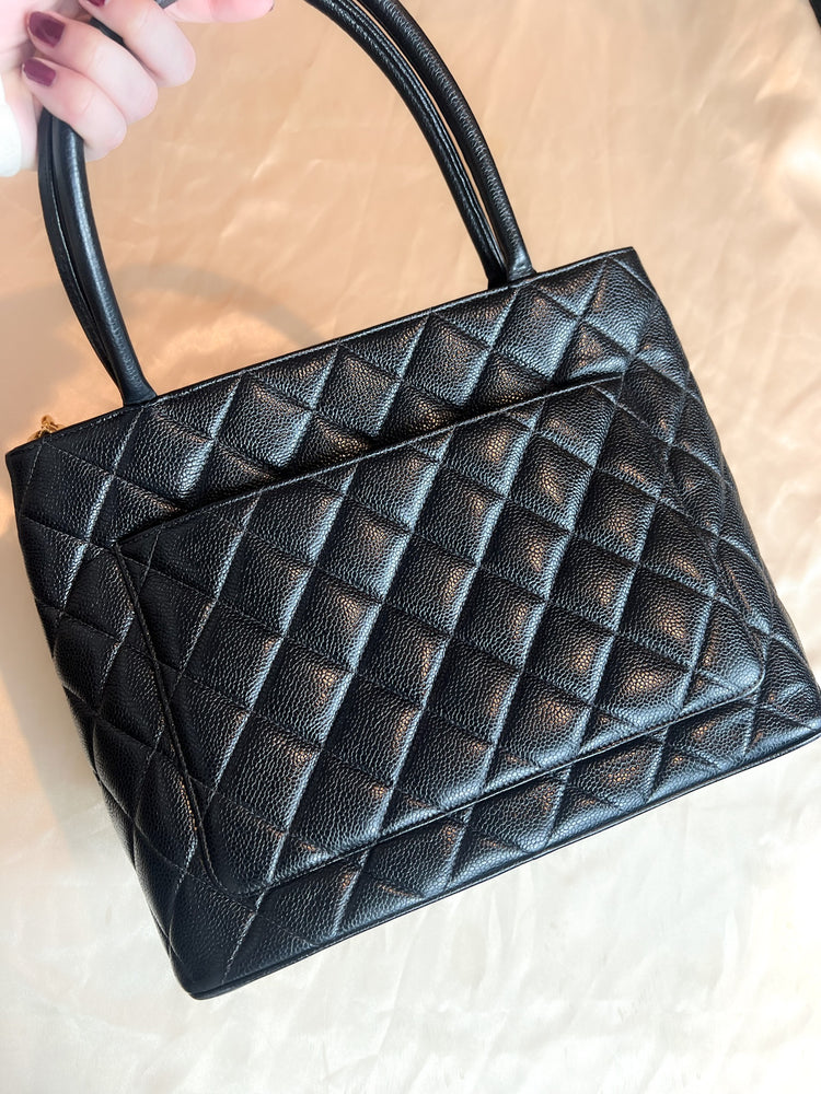 
                  
                    Chanel Caviar Quilted Medallion Tote Black
                  
                